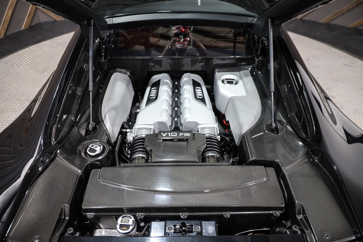 Audi R8 V10 engine bay with carbon-fiber trim, detailed