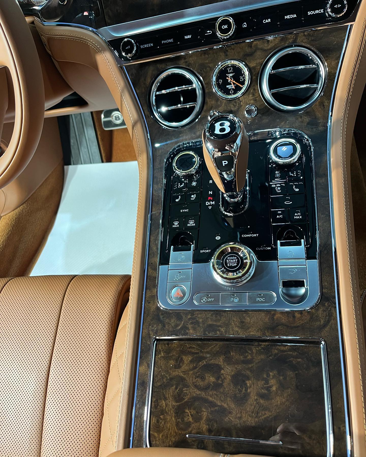 Bentley Continental GT center console with burl wood and B-emblem shifter